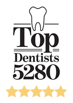 The image features a logo with text that reads  TOP DENTISTS 5280,  indicating a dental practice or service, and includes a graphic of a toothbrush and toothpaste tube, suggesting dental hygiene products or services are offered.